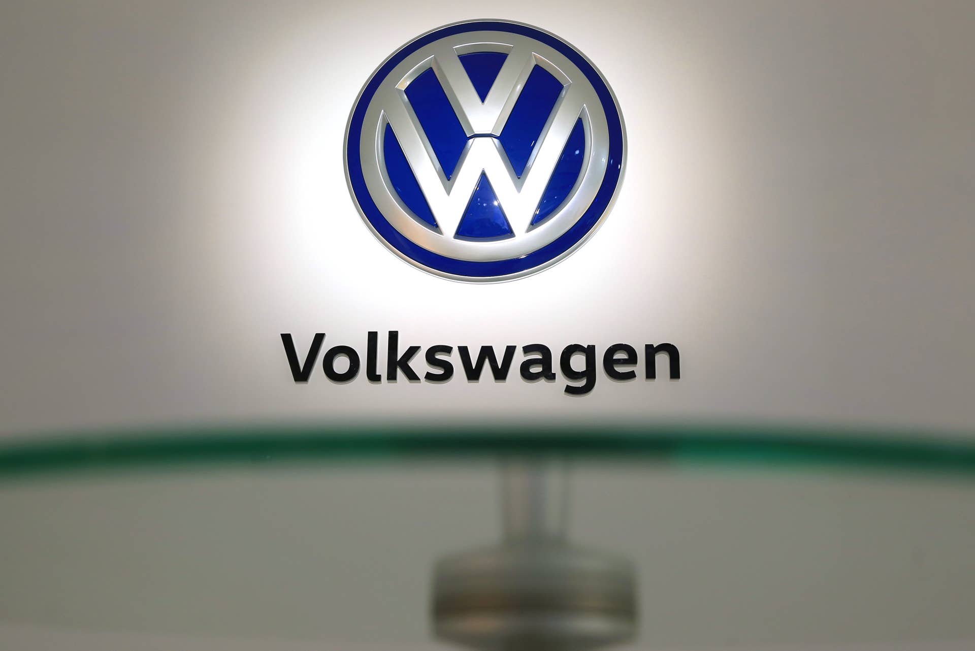The Volkswagen AG (VW) logo sits on a wall as the automaker announces the 'VW 2025' strategy plan at VW's headquarters in Wolfsburg, Germany, on Tuesday, Nov. 22, 2016. VW is going on the offensive in North America, challenging the likes of General Motors Co. and Ford Motor Co. with a wave of new sport utility vehicles and battery-powered cars. Photographer: Krisztian Bocsi/Bloomberg via Getty Images