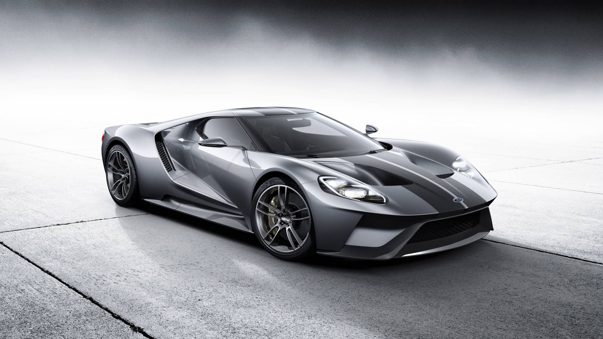 The all-new, carbon-fiber, mid-engined Ford GT supercar, expected to go into production in 2016, will redefine innovation in aerodynamics, EcoBoost and light-weighting. Shown in Liquid Silver with black racing stripes at the 2015 Chicago Auto Show.