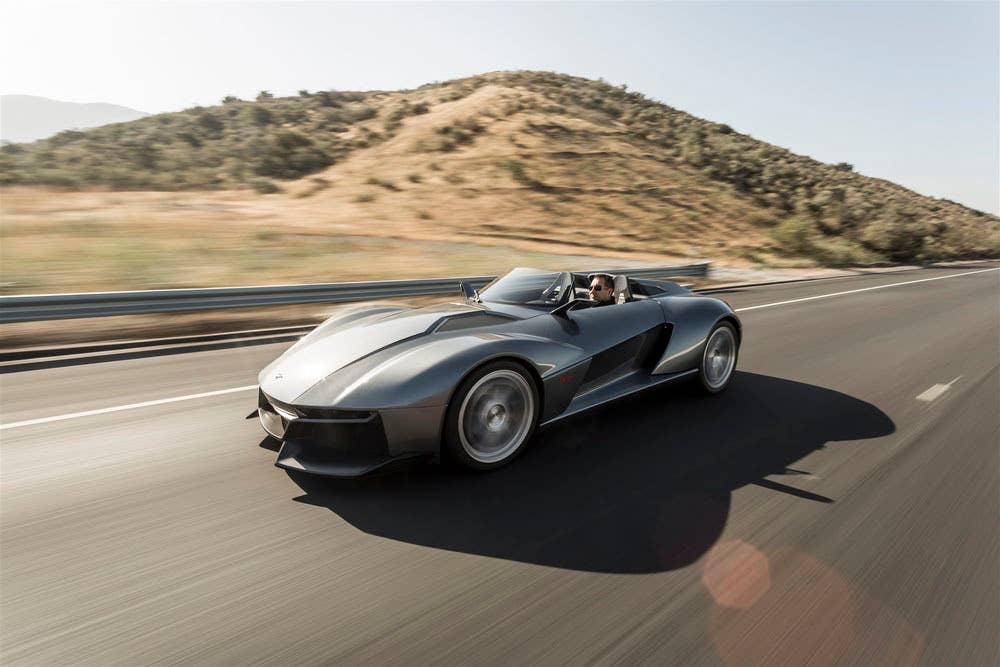 gray rezvani motors beast on the road three quarters