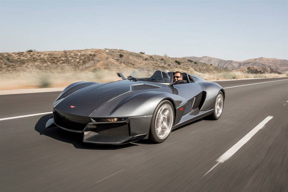 gray rezvani motors beast on road