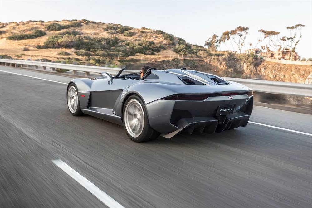 gray rezvani motors beast rear on the road