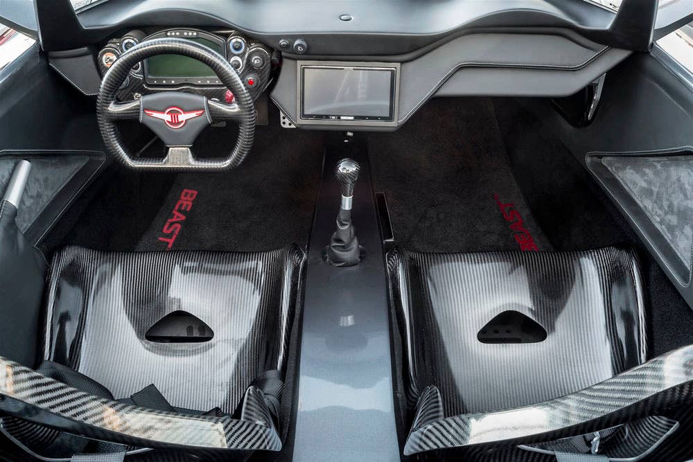 gray rezvani motors beast interior seats and dashboard
