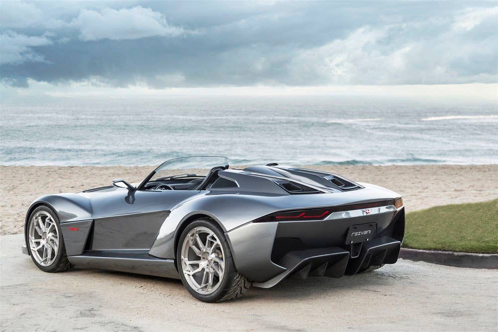 gray rezvani motors beast rear three quarters at the beach