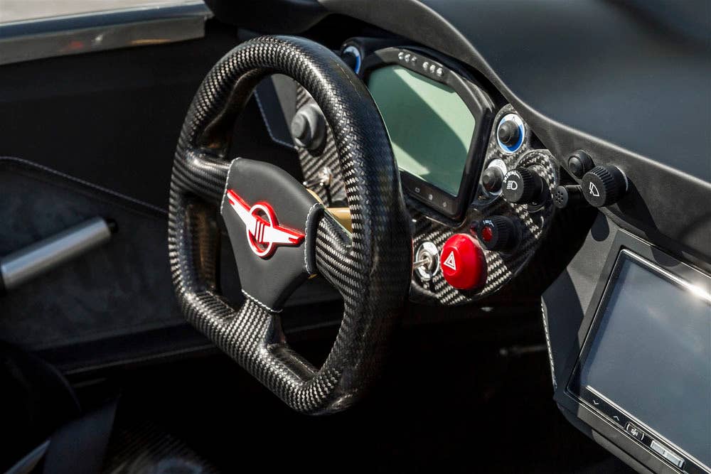 gray rezvani motors beast steering wheel