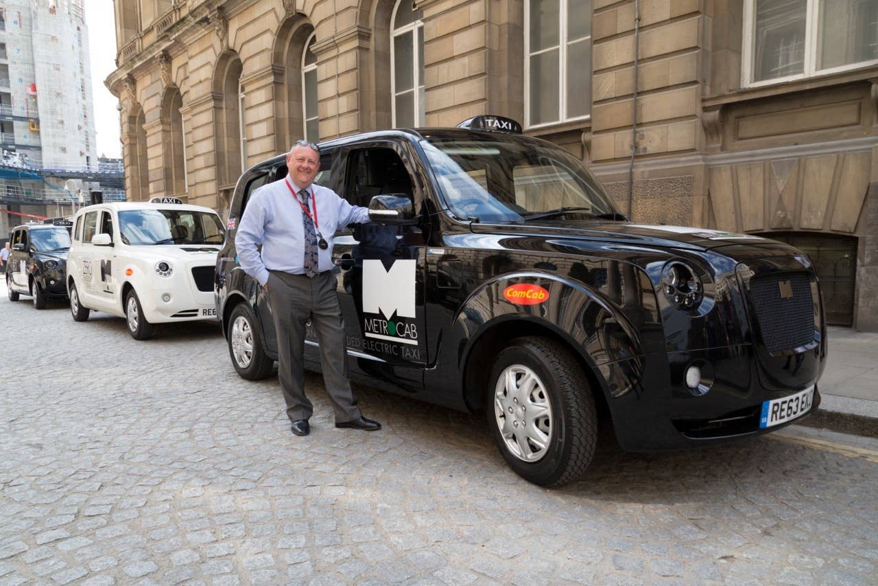 London cabbie Tony Norris with his all-new electric Metrocab