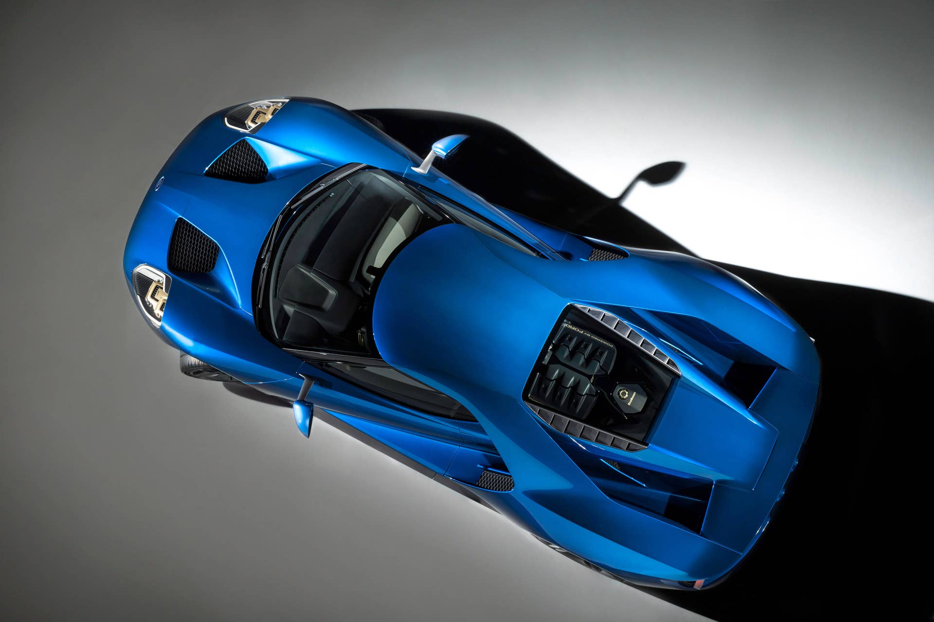The all-new Ford GT supercar is an ultra-high-performance, rear-wheel drive, carbon-fiber two-door coupe powered by a mid-mounted, twin-turbocharged EcoBoost® V-6 engine, and represents the pinnacle of the Ford Performance group as a showcase for Ford innovation and expertise in aerodynamics, lightweight construction and connected car technology.