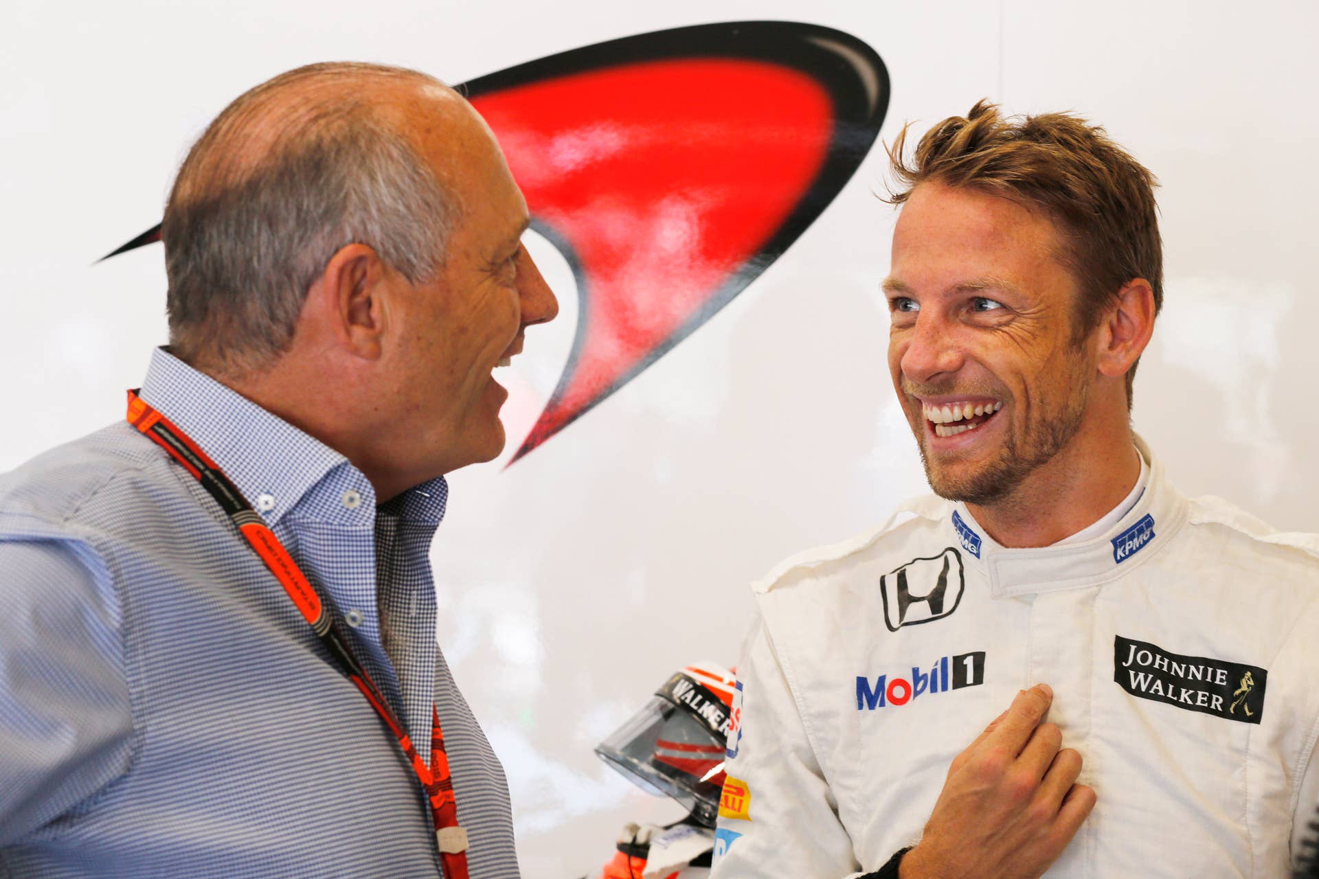 Ron Dennis with Jenson Button in the garage.
