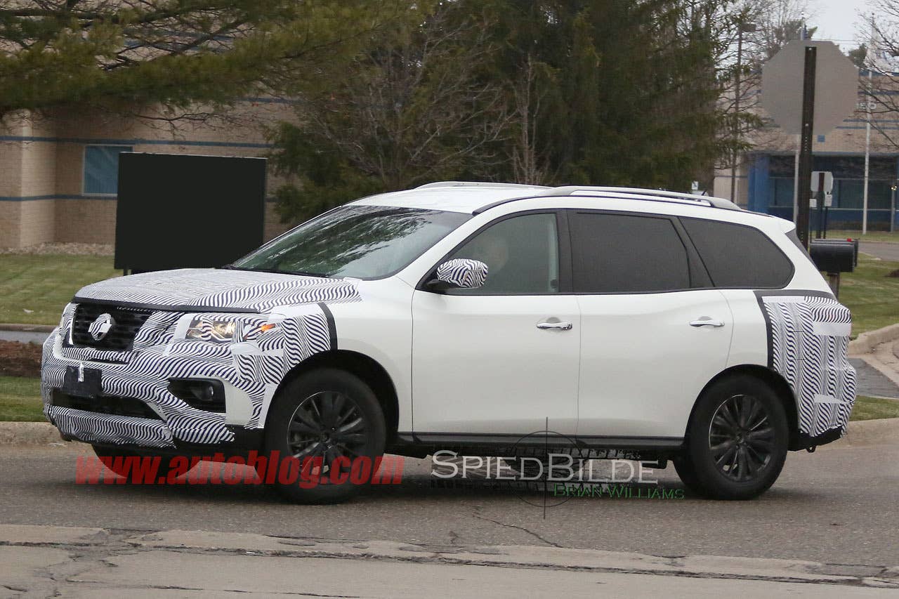white 2017 nissan pathfinder spy shot camouflaged nose and rear