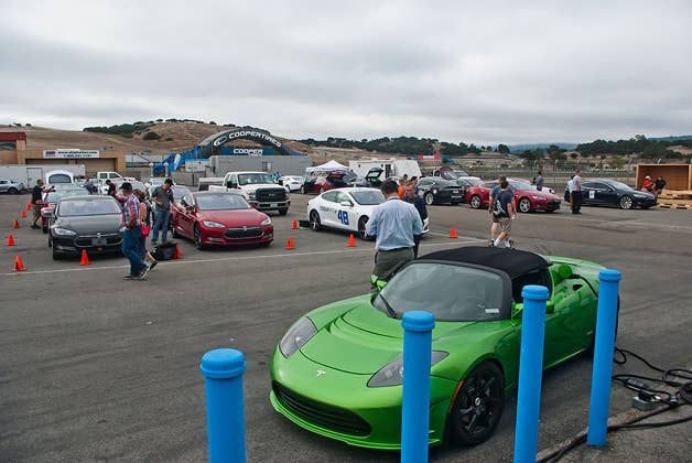 Teslas take over the Supercharger side of the parking lot at Refuel