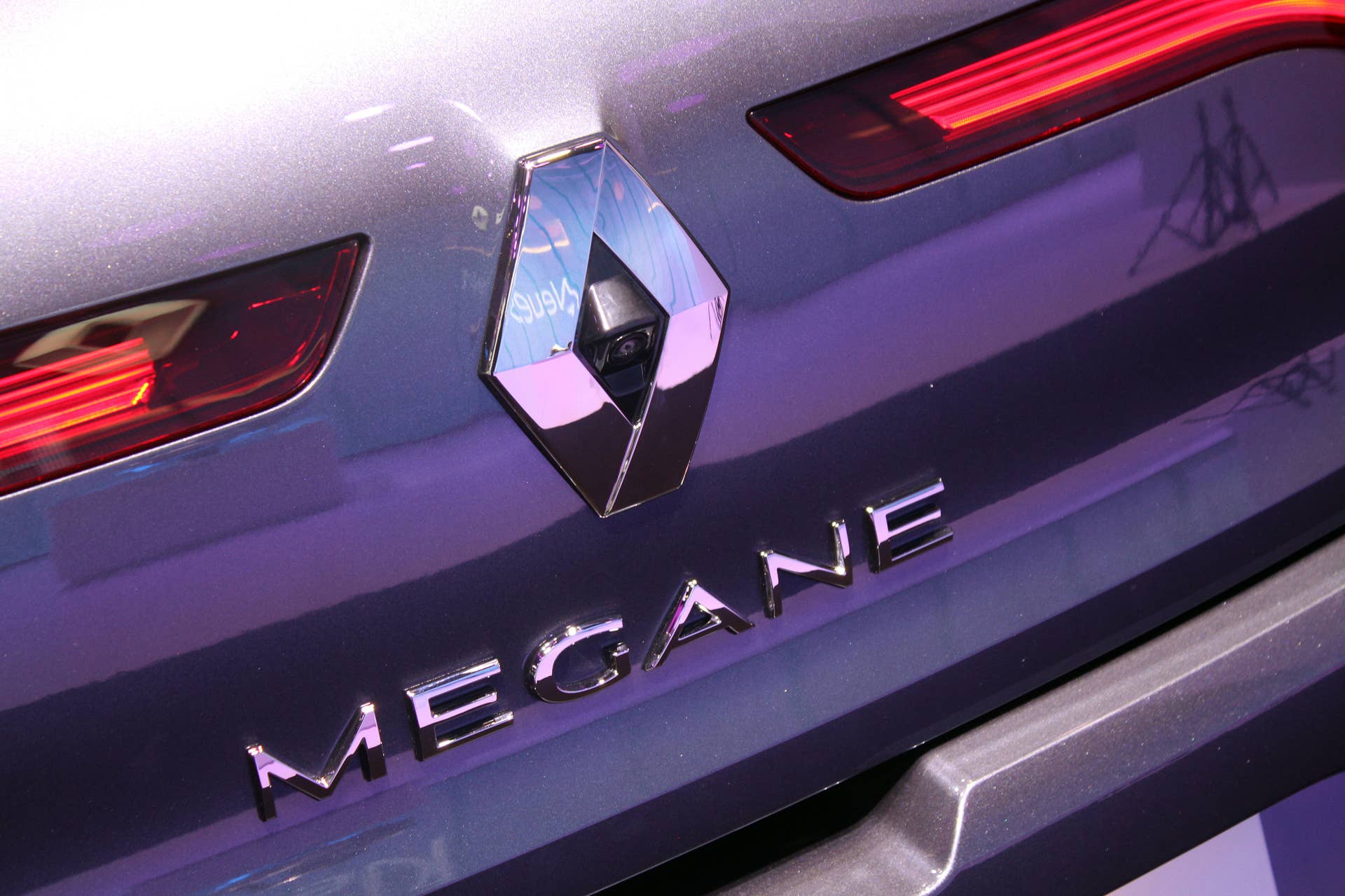 The 2016 Renault Megane, introduced at the 2015 Frankfurt Motor Show, close-up of the badge and rearview camera on the tailgate.
