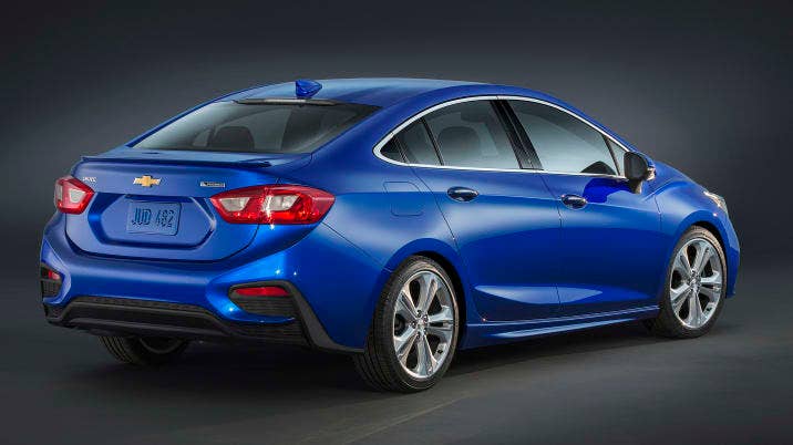 The new Cruze is 2.7 inches (68 mm) longer and nearly an inch (25 mm) shorter in height than the current model, giving it a longer and leaner appearance. A faster windshield rake and a faster-sloping rear profile lend a sportier look to the design, while the rear profile culminates in a standard integral rear spoiler that contributes to the car’s aero efficiency.