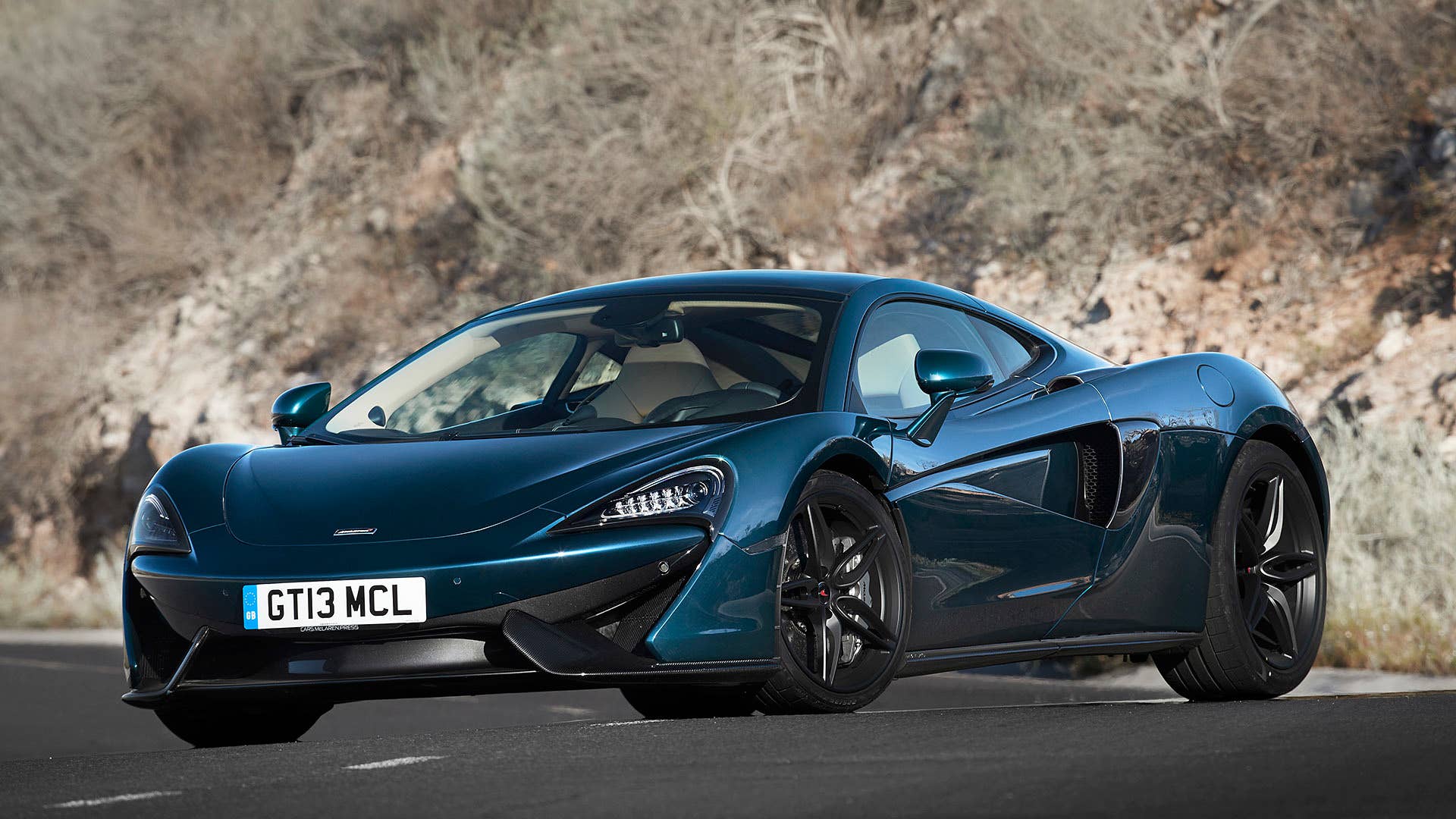 2017 McLaren 570GT front 3/4 view