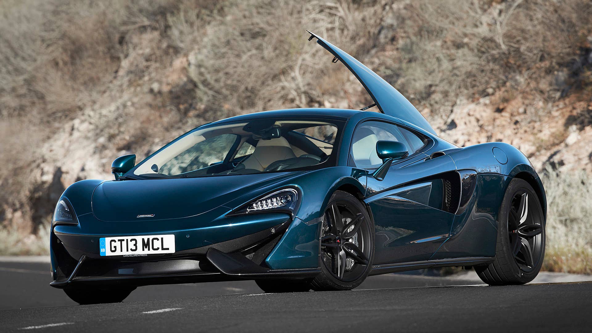2017 McLaren 570GT front 3/4 view