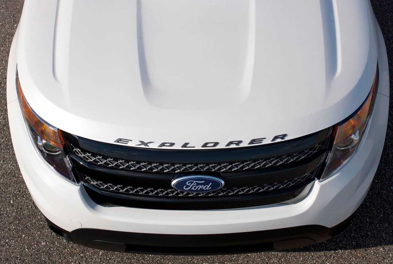 2013 Ford Explorer Sport: The first-ever high-performance Explorer model features a 365-horsepower, 3.5-liter EcoBoost V6, structural chassis enhancements for improved dynamics, and sporty design cues. (03/28/12)