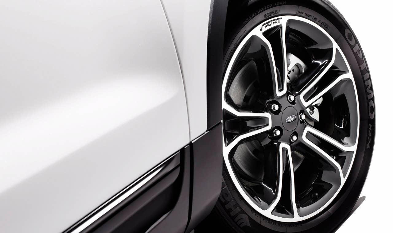 2013 Ford Explorer Sport: The first-ever high-performance Explorer model features a 365-horsepower, 3.5-liter EcoBoost V6, structural chassis enhancements for improved dynamics, and sporty design cues. (03/28/12)