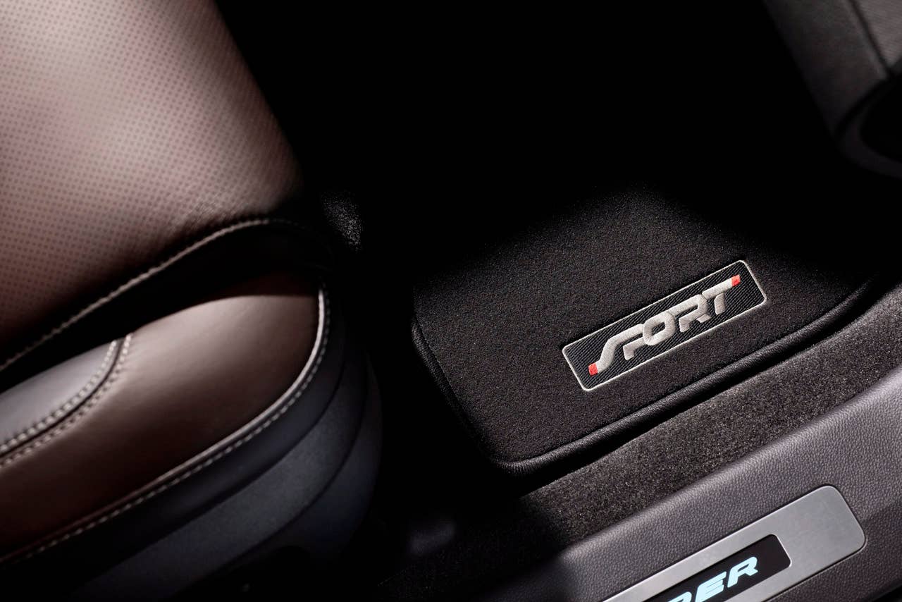 2013 Ford Explorer Sport: The new Explorer Sport features unique interior design cues and leather faced seats with contrast stitching, inspired by fashion accessories such as Prada handbags. (03/28/12)