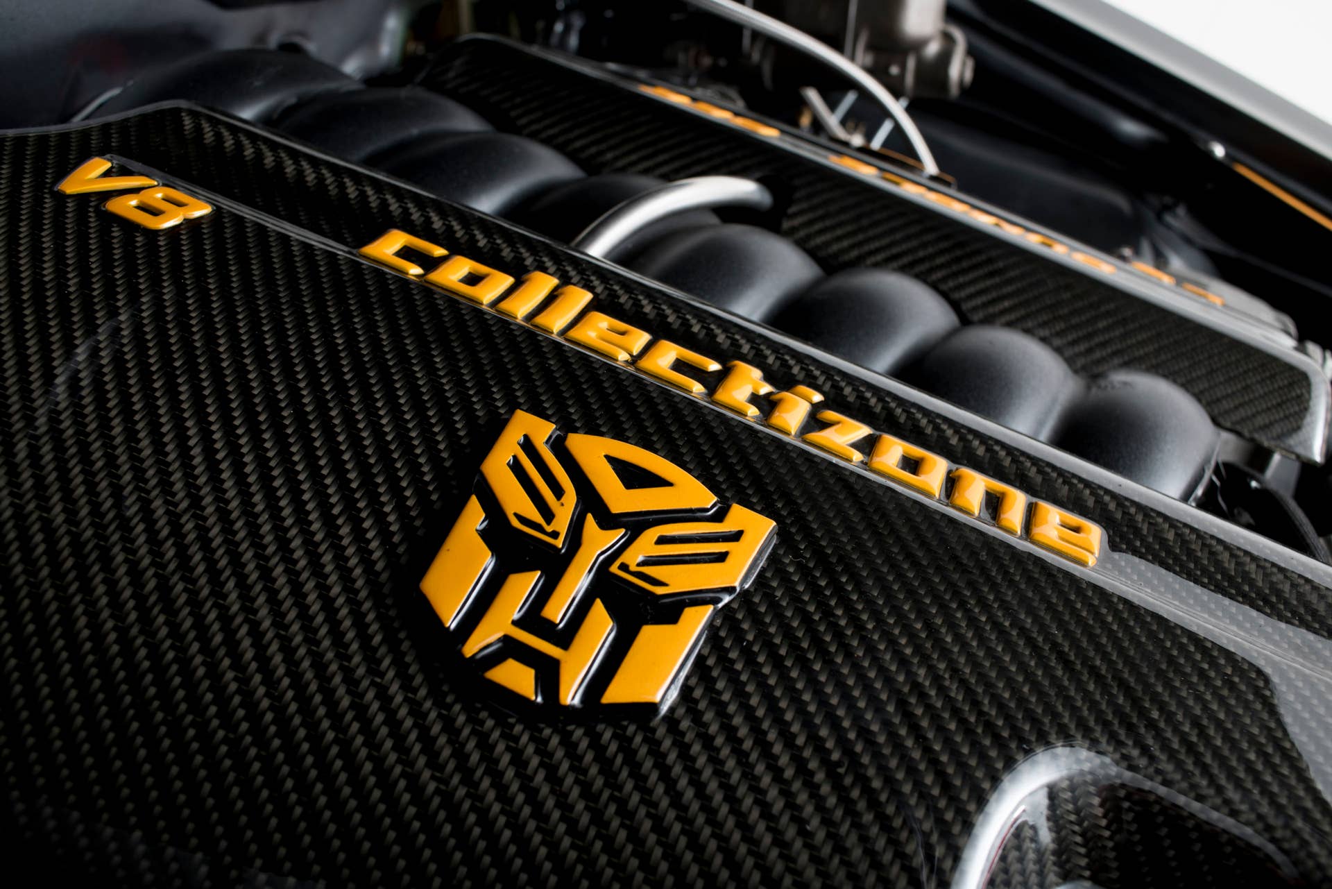 transformers auction bumblebee engine badge