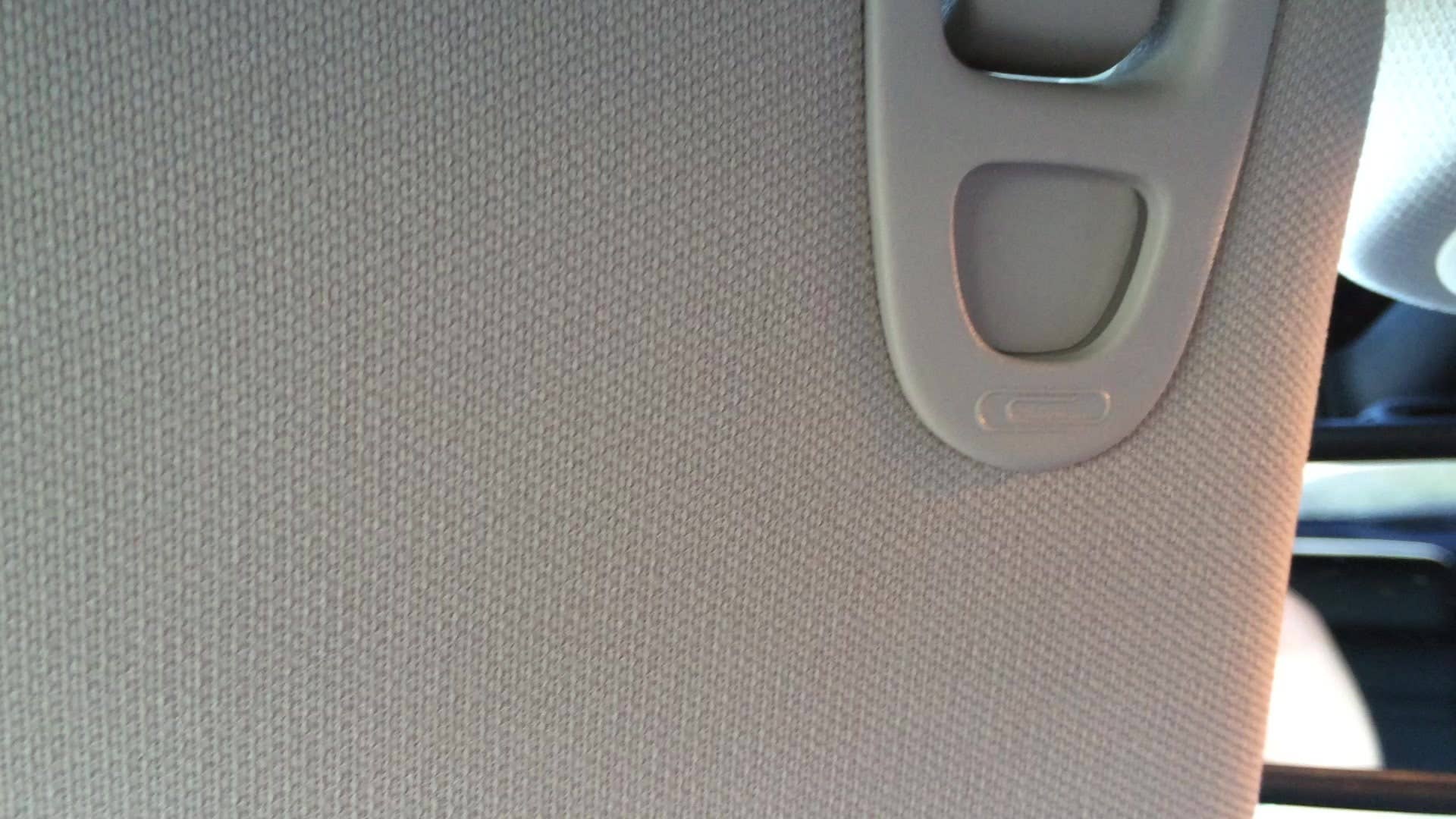 We're hunting for so called 'easter eggs' on the 2014 Jeep Cherokee Trailhawk, which designers hid throughout the vehicle. You'll find this paper clip symbol on the sun visor.