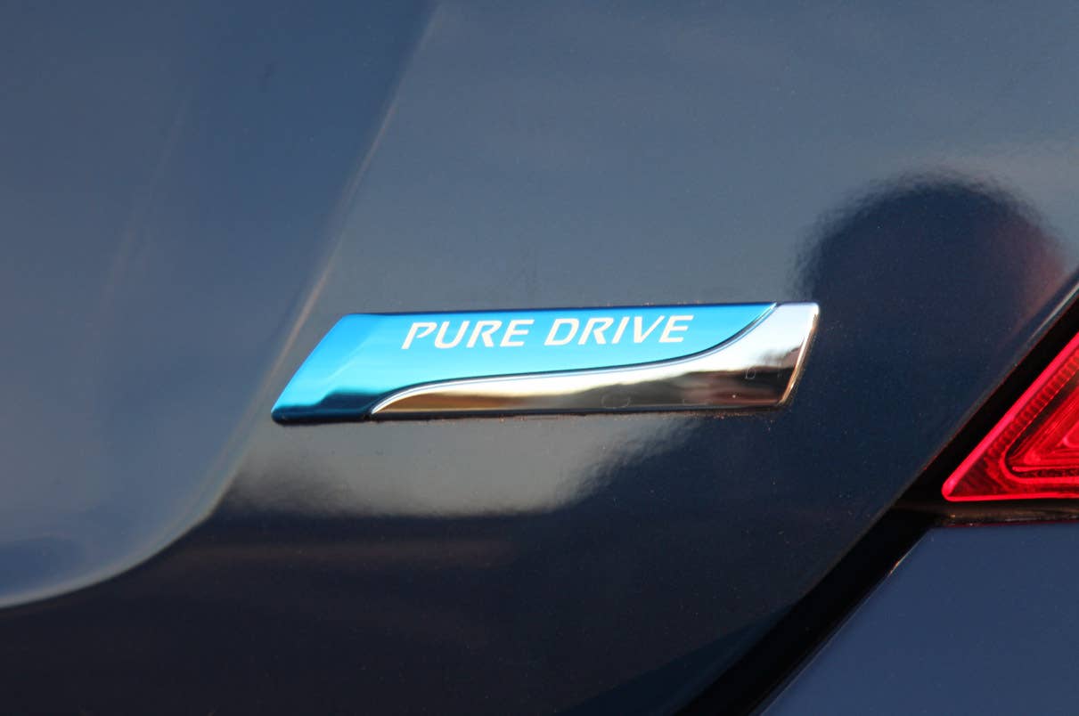 2012 Nissan Versa Sedan badge