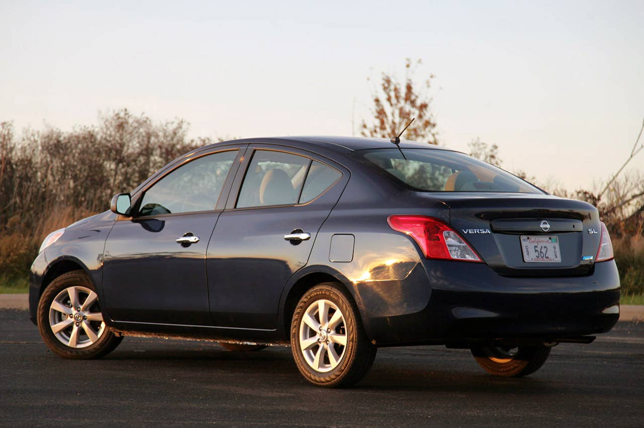 2012 Nissan Versa Sedan rear 3/4 view