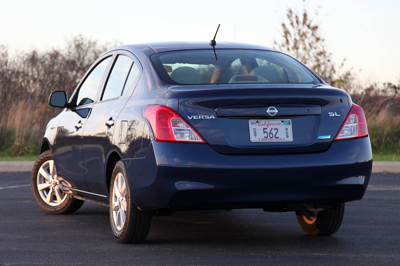 2012 Nissan Versa Sedan rear 3/4 view