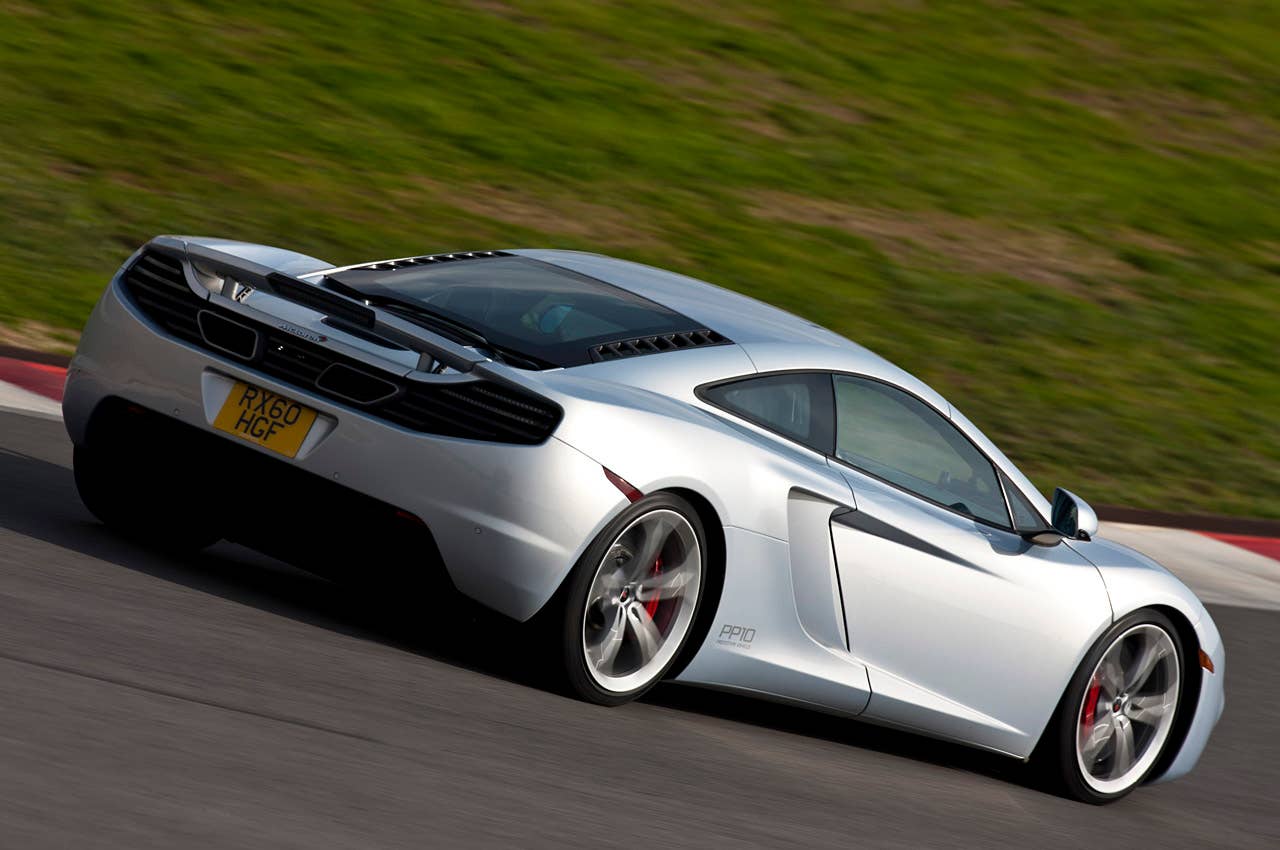 2012 McLaren MP4-12C driving on track