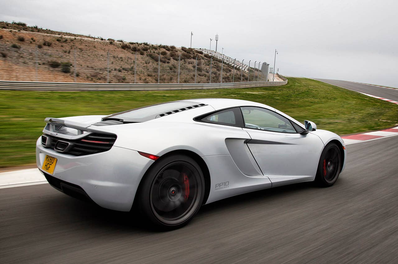 2012 McLaren MP4-12C driving on track