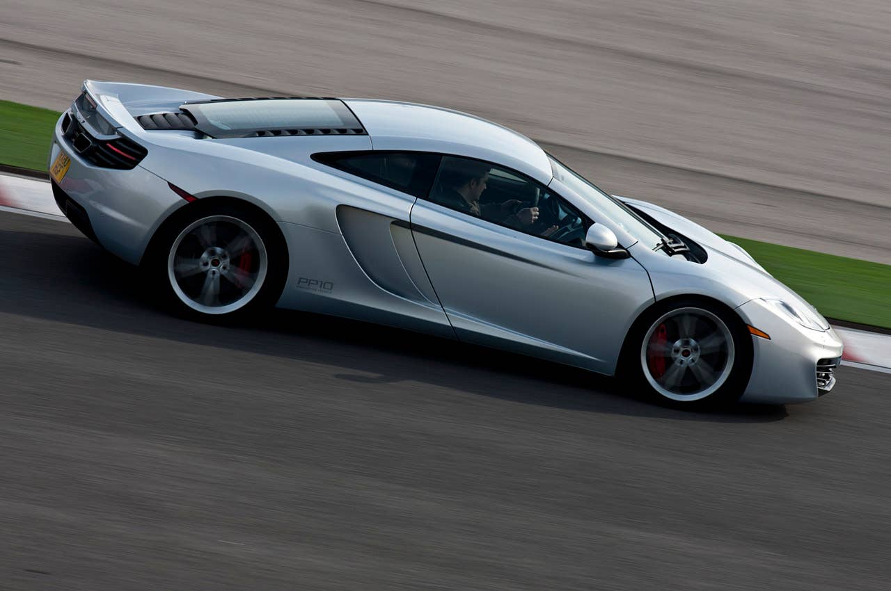 2012 McLaren MP4-12C driving on track
