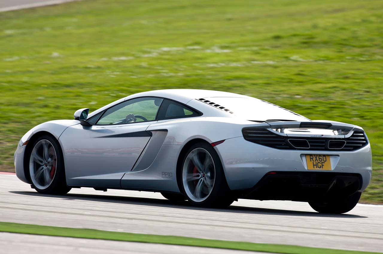 2012 McLaren MP4-12C driving on track