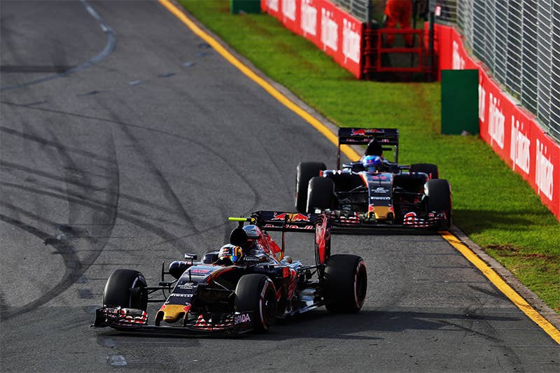 Two Toro Rossos race at the 2016 Australian F1 Grand Prix.