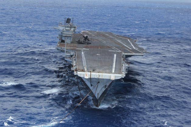 Ex-USS Saratoga being towed to its final destination.