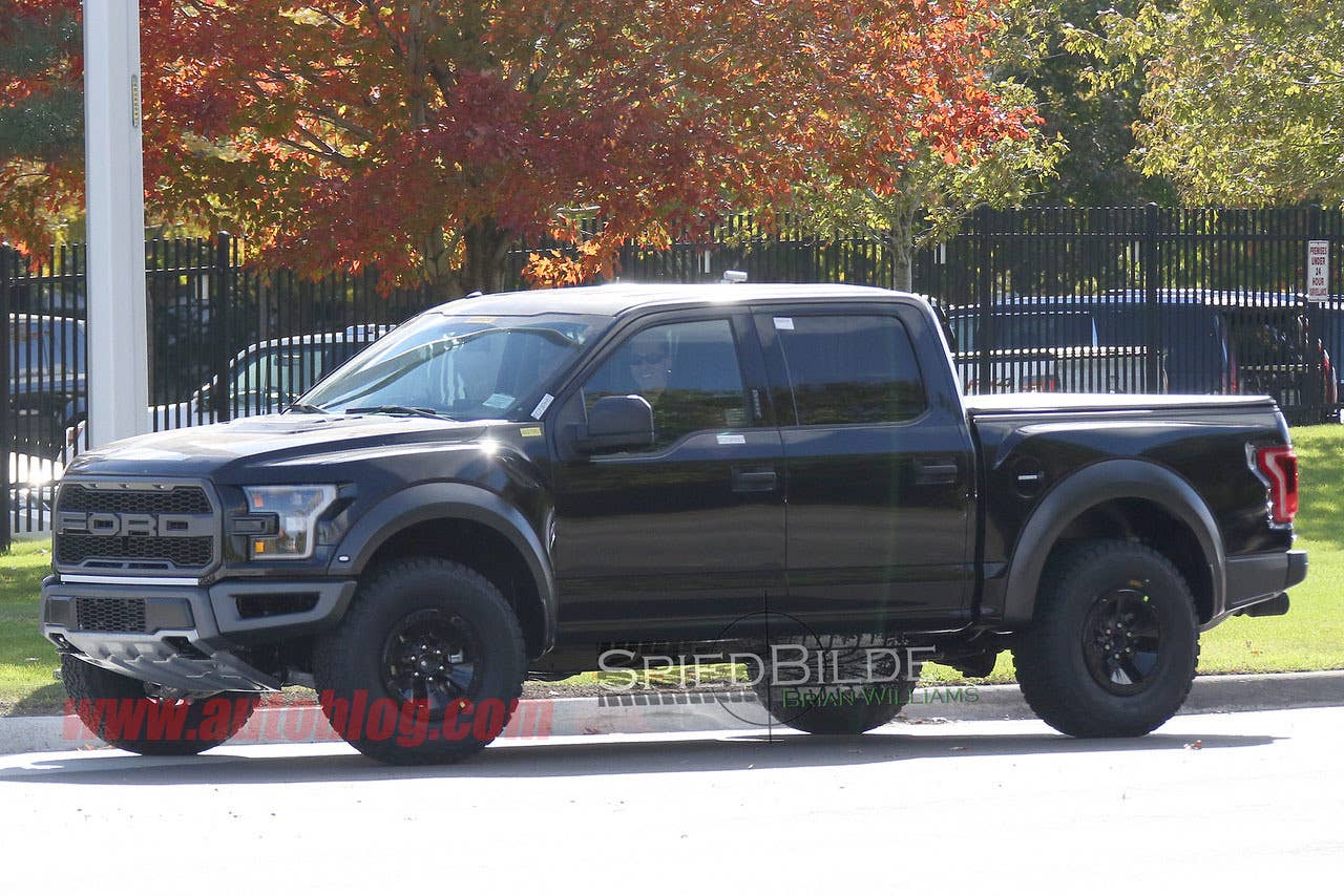 black 2017 ford f-150 raptor supercrew spy shot side
