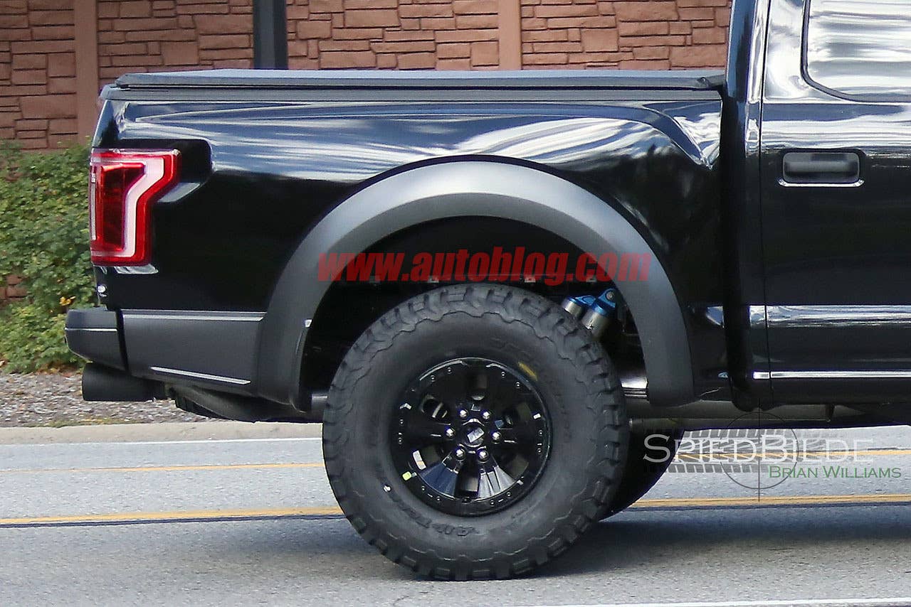 black 2017 ford f-150 raptor supercrew spy shot wheels and suspension