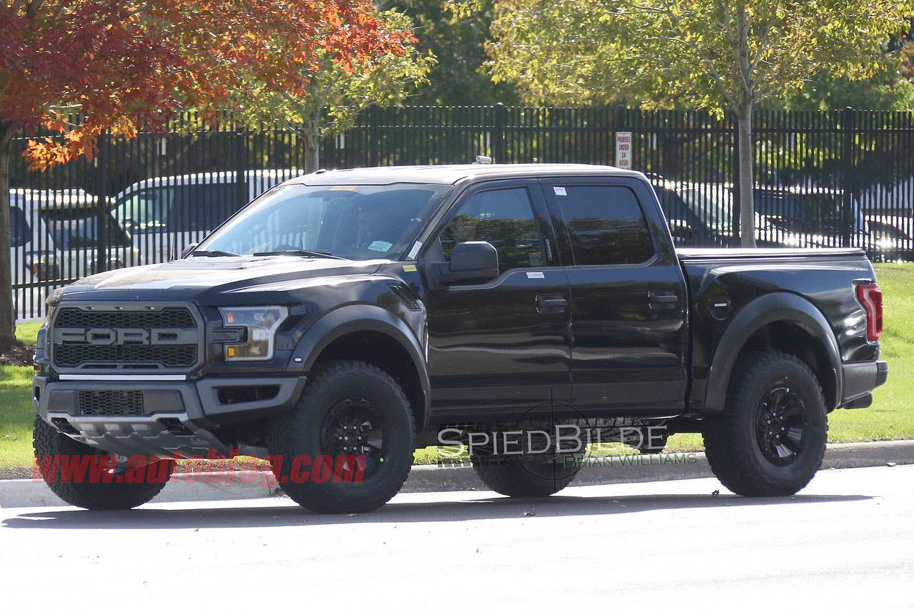 black 2017 ford f-150 raptor supercrew spy shot front three quarters