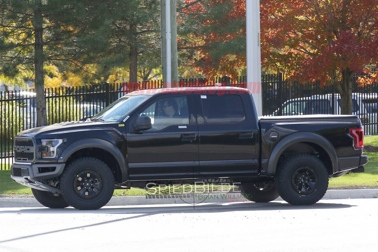 black 2017 ford f-150 raptor supercrew spy shot wheels and fenders