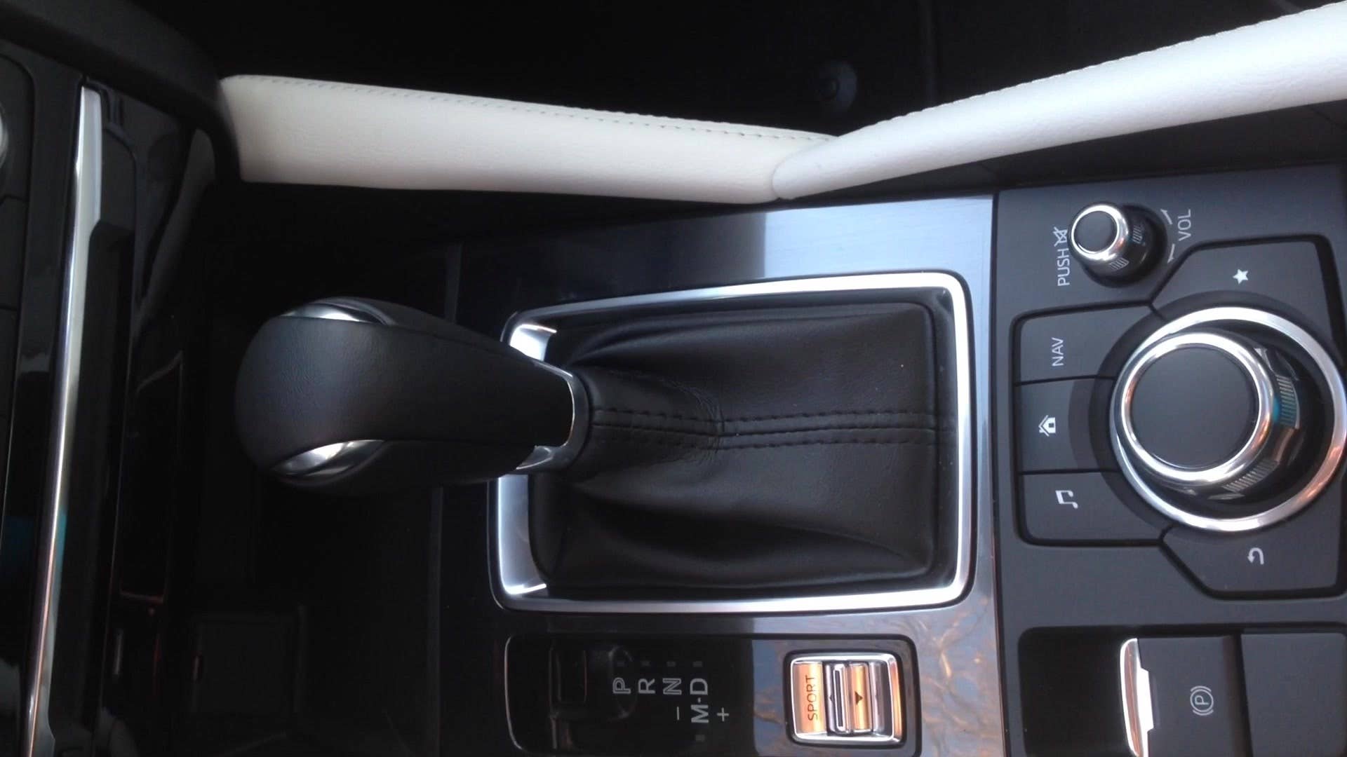 Greg Migliore shows off the center console features in the 2016 Mazda 6.