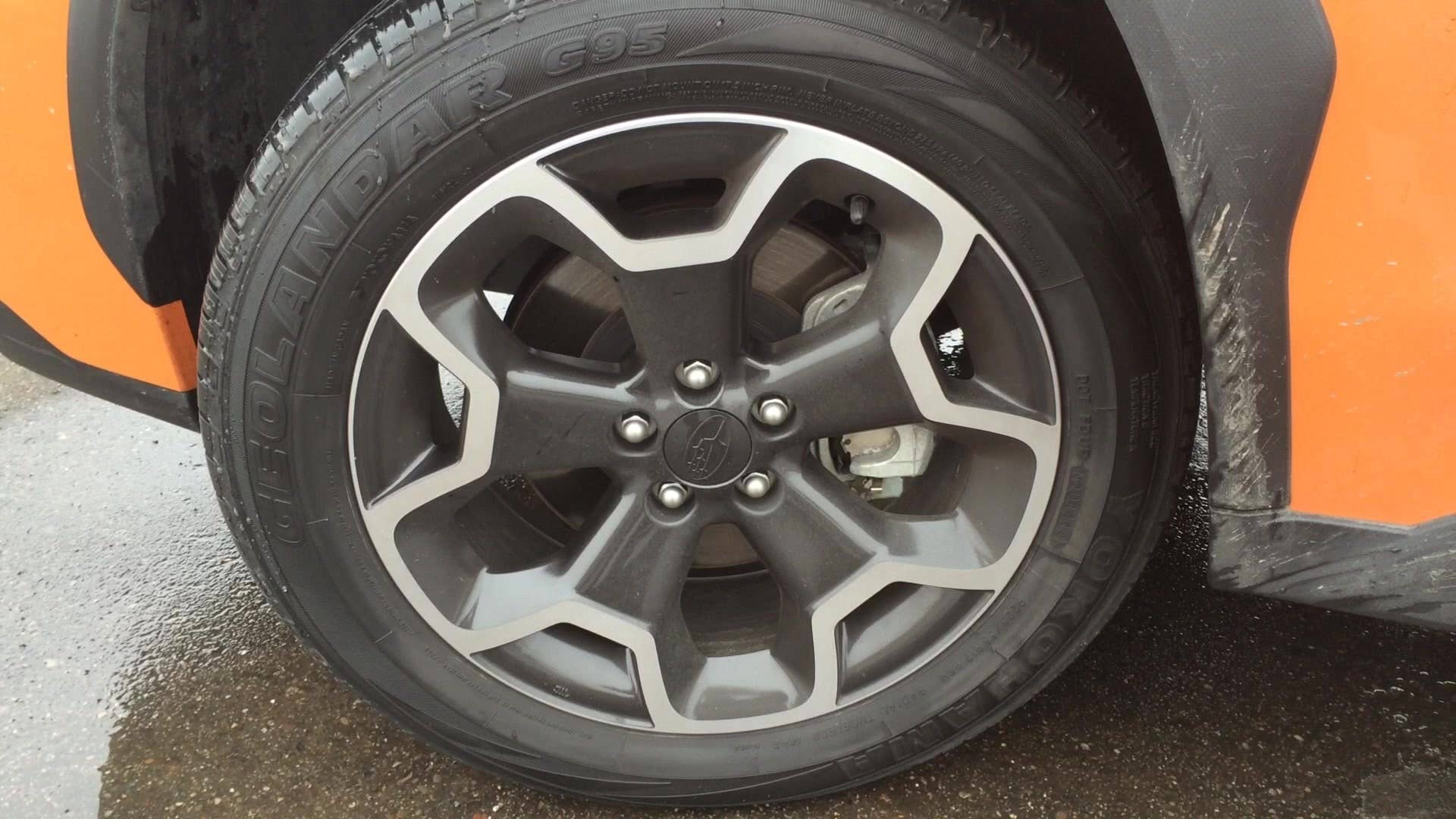 A close up look at the  17 inch dark gray alluminum alloy wheels on the 2015 Subaru XV Crosstrek.