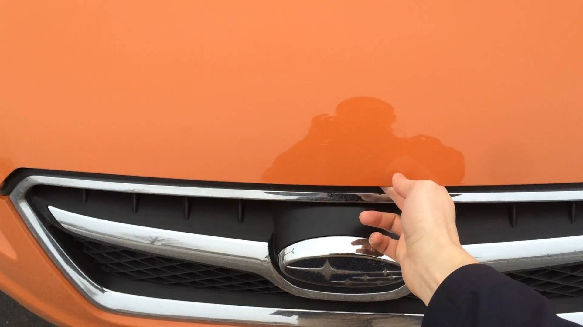 A quick look at how to unlatch the hood of the 2015 Subaru XV Crosstrek to access the engine compartment.