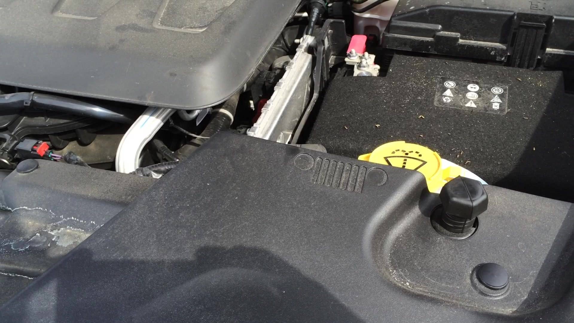 We're hunting for so called 'easter eggs' on the 2014 Jeep Cherokee Trailhawk. You'll find this classic Jeep emblem under the hood...