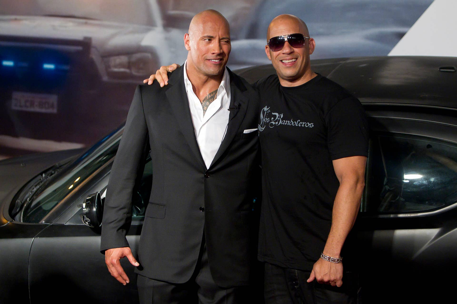 RIO DE JANEIRO, BRAZIL - APRIL 15: Dwayne Johnson (The Rock) and Vin Diesel (R) pose for photographers during the premiere of the movie 'Fast and Furious 5' at Cinepolis Lagoon on April 15, 2011 in Rio de Janeiro, Brazil. (Photo by Buda Mendes/LatinContent/Getty Images)