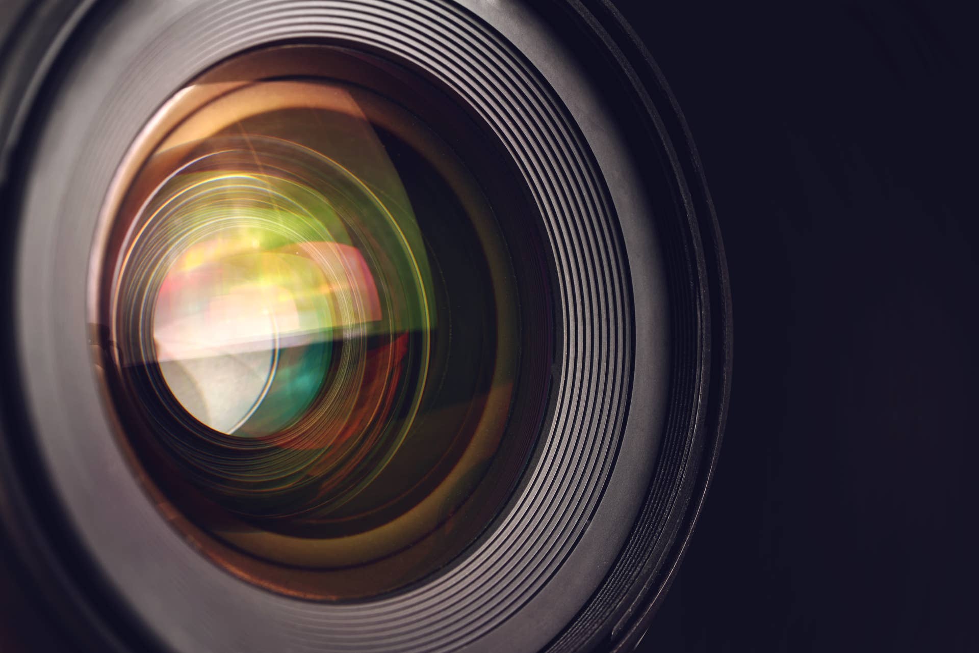 Camera lens detail, front glass of wide angle photography DSLR camera lens, macro shot