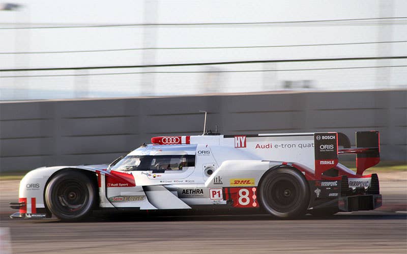 The Audi R18 E-Tron Quattro races at the 2015 Lone Star Le Mans.