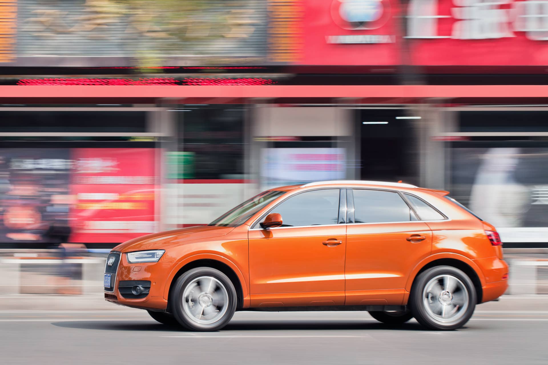 WENZHOU-CHINA-NOV. 19, 2014. New Audi Q3 on the street. German Audi, BMW and Mercedes-Benz maintain a solid grip on China's luxury car market, sell most of their models for more than 300,000 yuan.