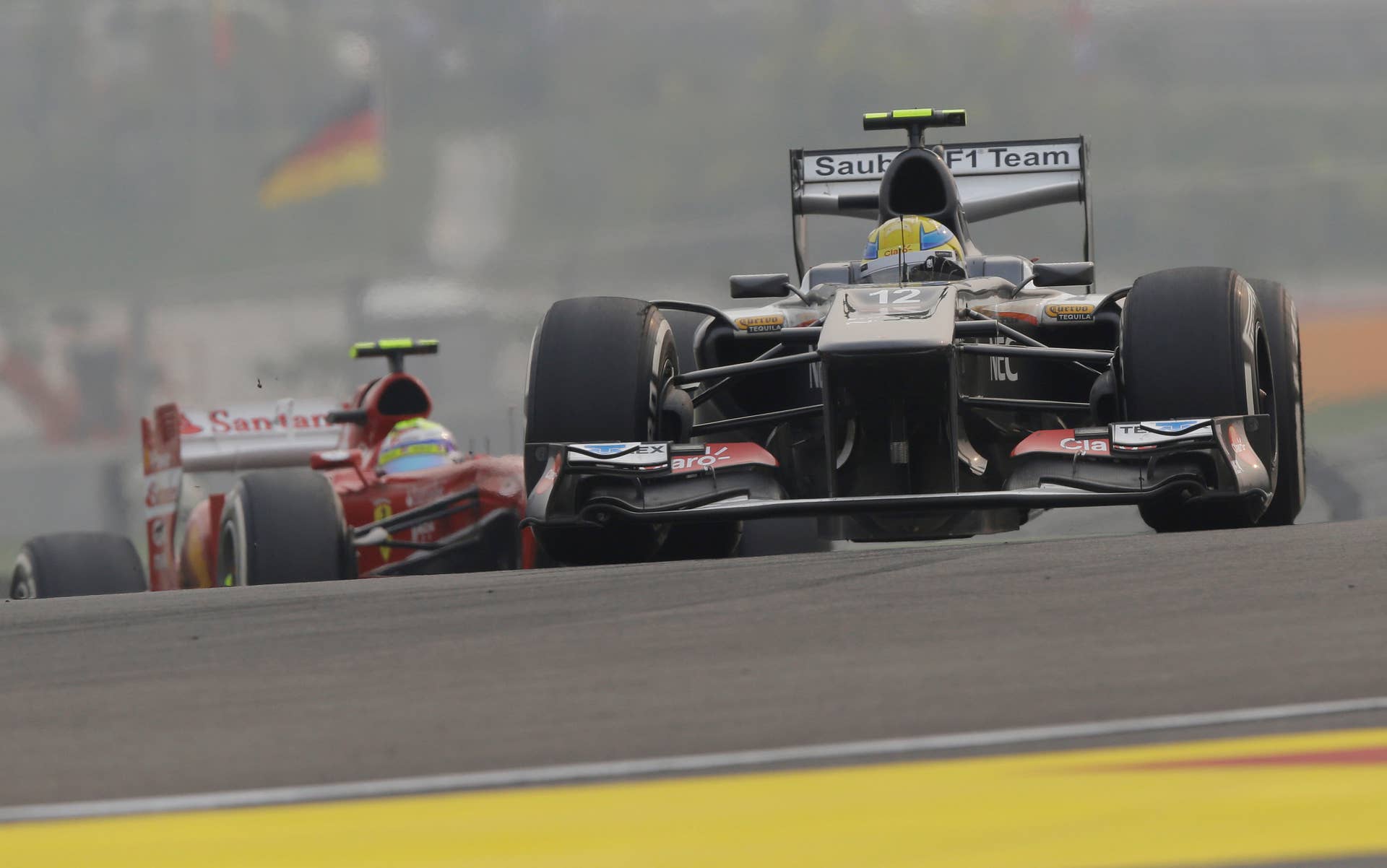 Sauber driver Esteban Gutierrez of Mexico leads Ferrari driver Felipe Massa of Brazil  during the Indian Formula One Grand Prix at the Buddh International Circuit in Noida, India, Sunday, Oct. 27, 2013. (AP Photo/Mark Baker)