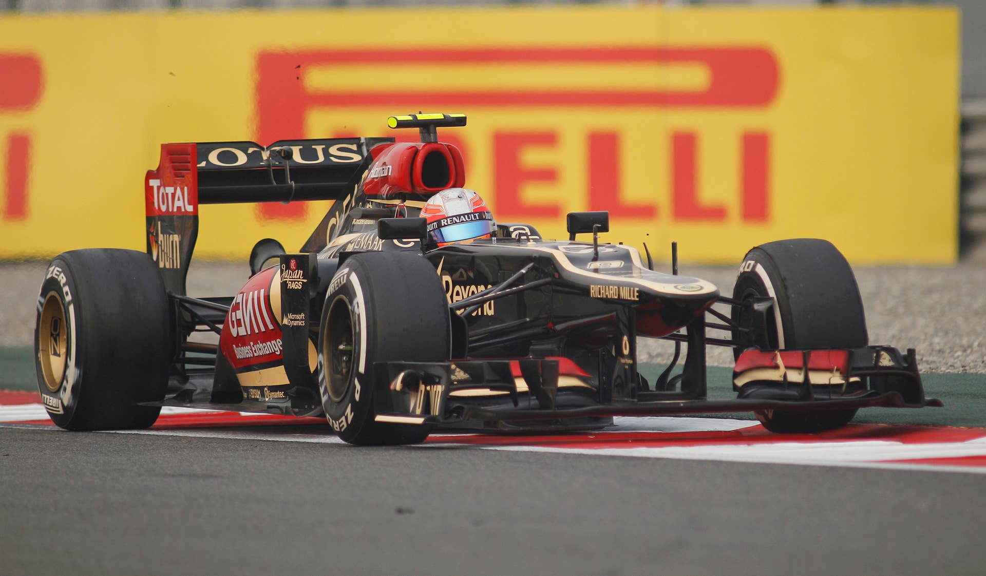 Lotus driver Romain Grosjean of France steers his car during the Indian Formula One Grand Prix at the Buddh International Circuit in Noida, India, Sunday, Oct. 27, 2013. (AP Photo/Altaf Qadri)