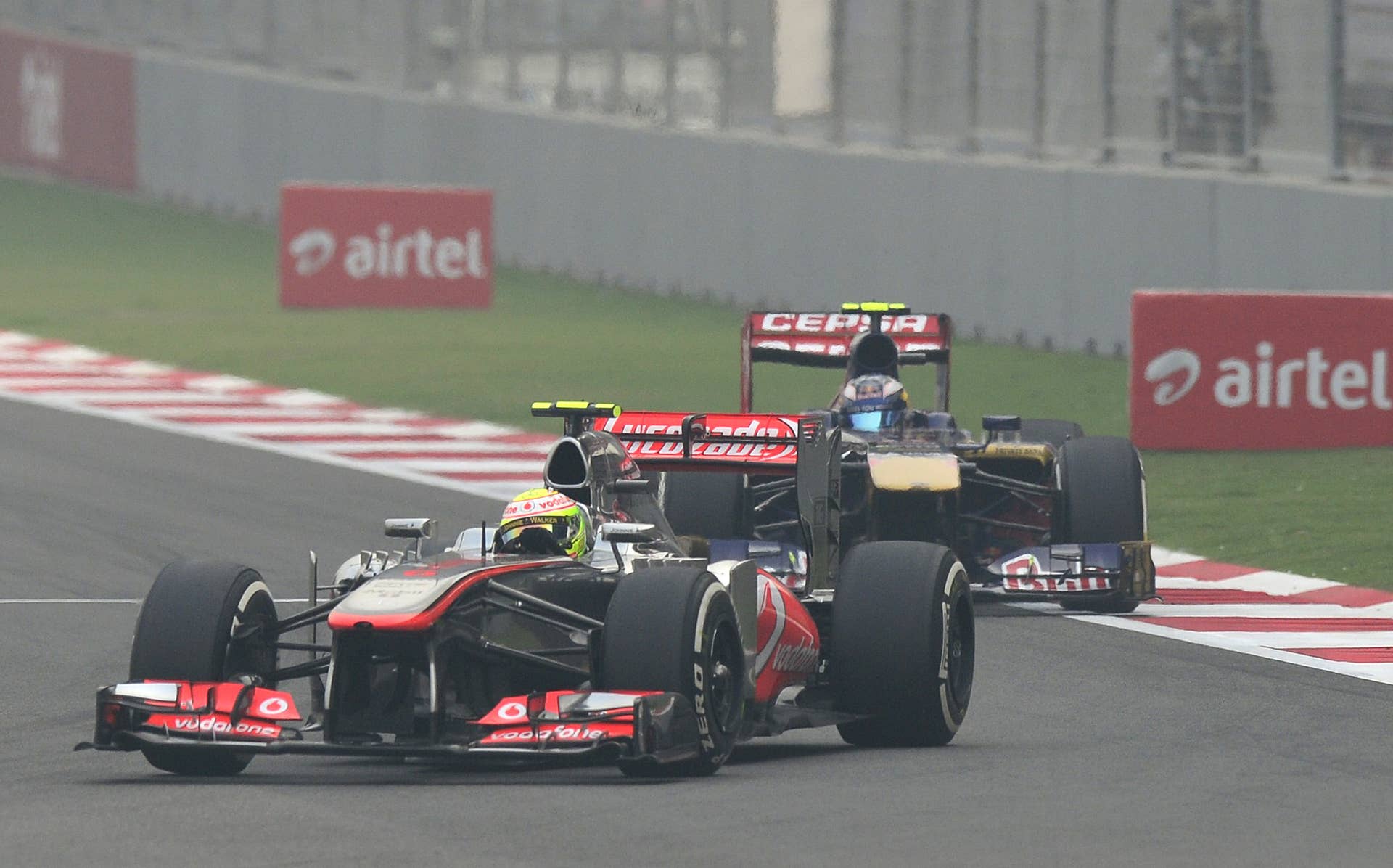 McLaren driver Sergio Perez Mendoza of Mexico drives his car during the Formula One Indian Grand Prix 2013 at the Buddh International circuit in Greater Noida, on the outskirts of New Delhi on October 27, 2013.  AFP PHOTO/ MANAN VATSYAYANA        (Photo credit should read MANAN VATSYAYANA/AFP/Getty Images)
