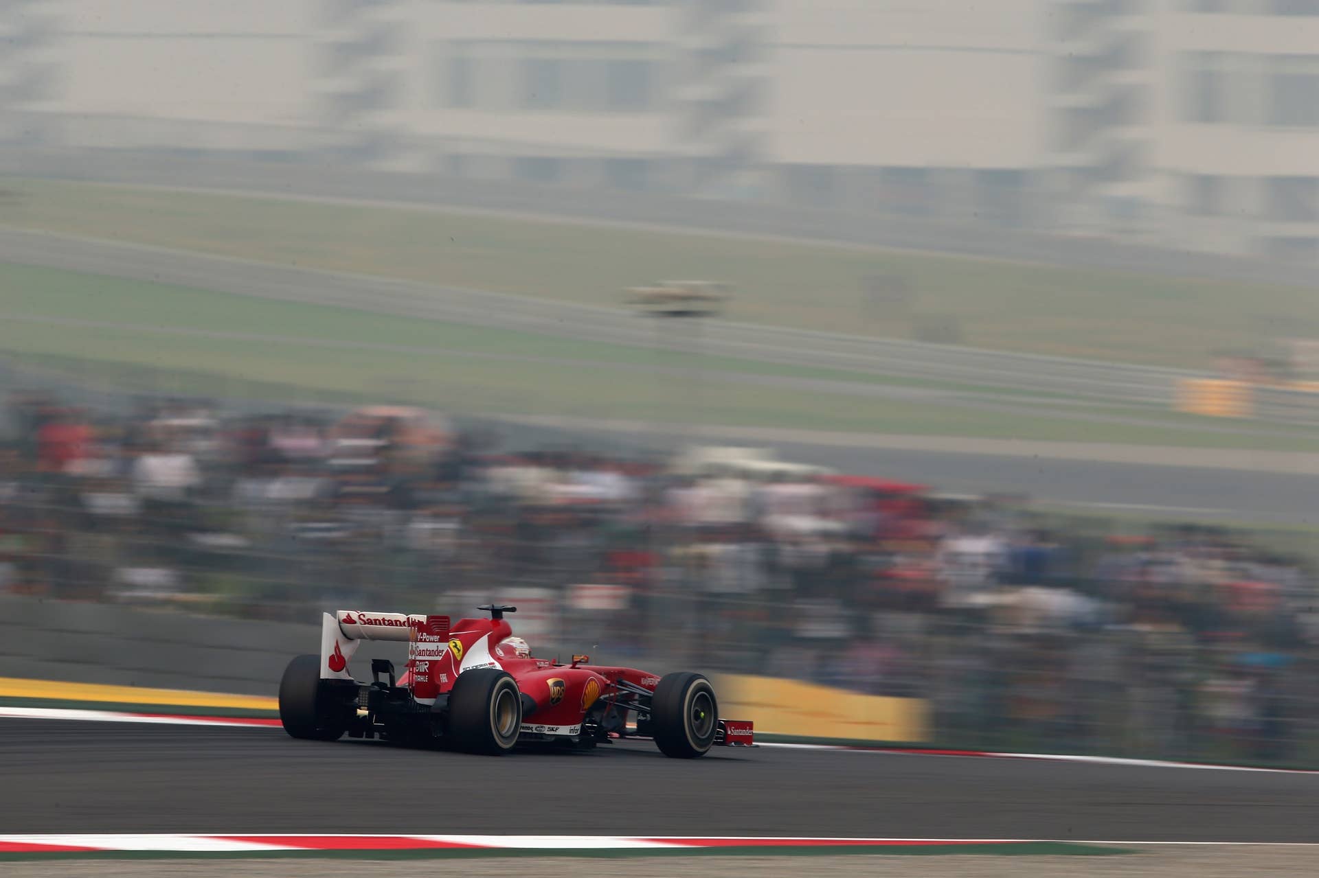 NOIDA, INDIA - OCTOBER 27:  Fernando Alonso of Spain and Ferrari drives during the Indian Formula One Grand Prix at Buddh International Circuit on October 27, 2013 in Noida, India.  (Photo by Clive Mason/Getty Images)