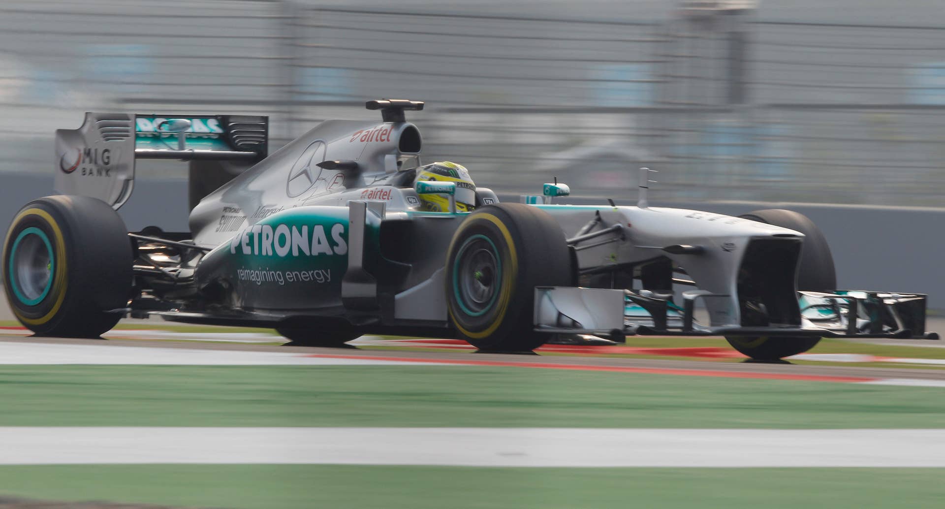 Mercedes driver Lewis Hamilton of Britain steers his car during qualifying at the Indian Formula One Grand Prix at the Buddh International Circuit in Noida, India, Saturday, Oct. 26, 2013. (AP Photo/Altaf Qadri)