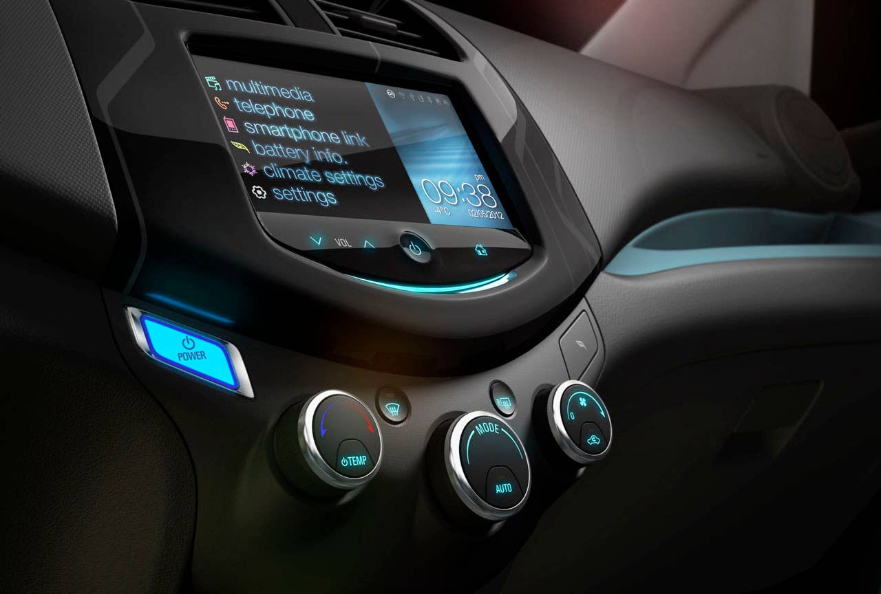 The 2014 Chevrolet Spark EV,unveiled at the 2012 Los Angles Auto Show,gives EV drivers the high tech infotainment they want- and need- to get the most out of their EV experience. With two reconfigurable, HD, seven inch color LCD screens, the Spark EV features a customizable interface with confidence gauge. Spark EV also has Chevrolets exclusive MyLink radiowhich brings smartphone-based infotainment including apps for BringGofull-function navigation, Siri voice recognition, TuneInglobal internet radio, Pandoraand Stitcher into the vehicle. Note: All Spark EV range values represented in these photographs are for reference only and do not represent the range of the vehicle.