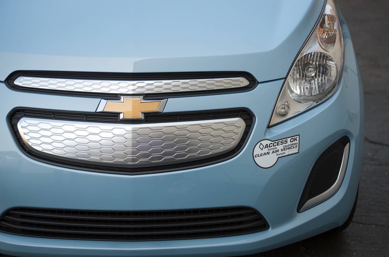 The 2014 Chevrolet Spark EV pure electric vehicle builds on Chevrolets proven electric motor and battery development programs. When it goes on sale next summer, the Spark EV will be eligible for coveted high-occupancy vehicle (HOV) lanes in California. The Spark EV is expected to have among the best EV battery range in its segment and will be priced under $25,000 with tax incentives. (Photo by Steve Fecht for Chevrolet)